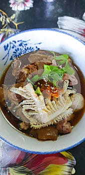 Braised beef clear noodle with meat ball soup stew