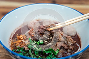 Braised beef clear noodle with meat ball soup stew