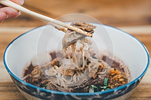 Braised beef clear noodle with meat ball soup stew