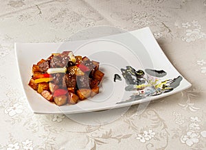 Braised Beef Fillet with Potato Wedges served dish isolated on background top view of hong kong chinese food