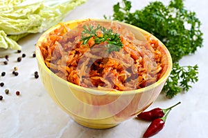 Braised cabbage from tomato sauce on a table. Lenten menu. Diet low-calorie vegetable dish