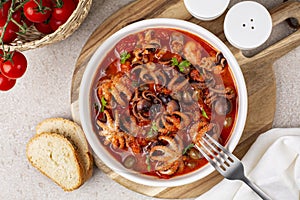 Braised octopus stew with tomato sauce photo