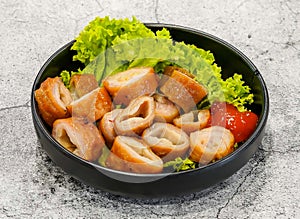 braised pig ears or pha lau khia served in dish isolated on grey background top view of singapore seafood