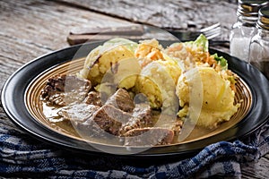 Braised pork tongues in horseradish sauce