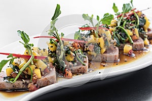 Braised tuna and spicy mango modern asian fusion gourmet salad