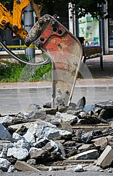 Braking the asphalt at the road construction