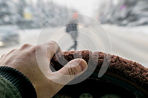 Braking a car against the background of a pedestrian who suddenly appeared