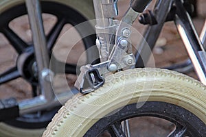 Braking mechanism on wheelchair