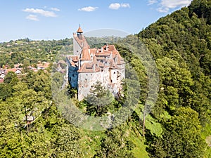 Bran castle on a hill. Dracula's Castle. Surrounded by Bran town, Wallachia, Transylvania, Romania.