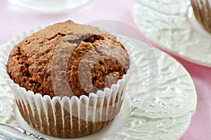 Bran muffin on pretty plate