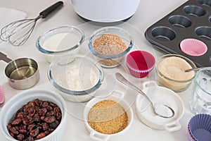 Bran muffins with dry cranberries recipe. Bran, flour, buttermilk, dry berries, and some other ingredients close up