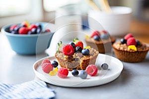 bran muffins with fresh berries on top