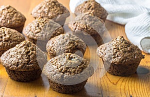 Bran muffins on wood, home made cup cakes with selective focus