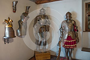 Bran, Romania: Ancient knight armor. The Interior of the medieval Bran Castle, home of Vlad Tepes Dracula, Brasov, Transylvania,