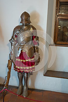 Bran, Romania: Ancient knight armor. The Interior of the medieval Bran Castle, home of Vlad Tepes Dracula, Brasov, Transylvania,