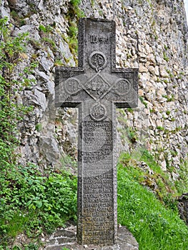 Medieval stone cross at the Bran Castle, known also as DraculaÃ¢â¬â¢s Castle in Transylvania, Romania