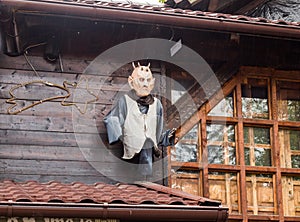 Decorative vampire figure attached to the wall near the entrance to the Bran castle in Bran city in Romania