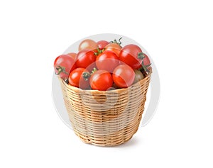 cherry tomatoes in basket isolated on white background