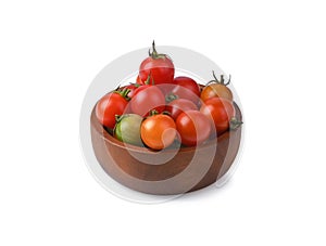 cherry tomatoes in a wooden bowl, isolated on white background