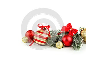 Branch of Christmas tree with balls isolated on white background