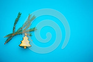 Branch Christmas tree on a colored background, a place for text