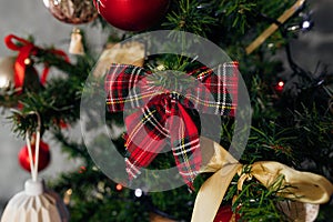 Branch Christmas tree, pine trees. Christmas decoration, red bow. Christmas eve. Happiness, New Year