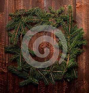 Branch Frame on a Dark Wooden Background