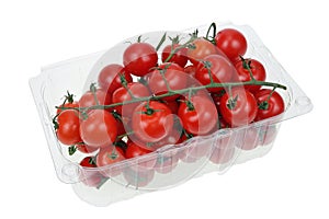 Branches with Cherry tomatoes in commercial plastic packaging isolated