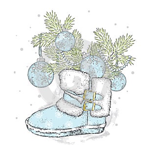 Branches of a Christmas tree in New Year`s boots. New Year`s and Christmas. Winter.