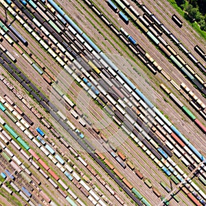 Branches of the railway at the marshalling yard, a lot of freight wagons from the height