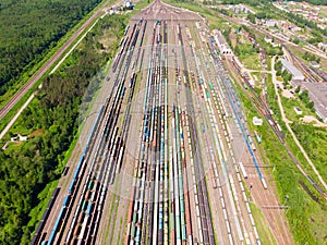 Branches of the railway at the marshalling yard, a lot of freight wagons from the height