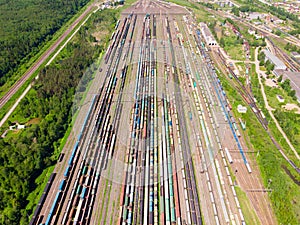 Branches of the railway at the marshalling yard, a lot of freight wagons from the height