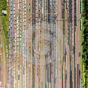 Branches of the railway at the marshalling yard, a lot of freight wagons from the height