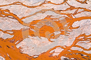 Branching orange riverbed closeup photo