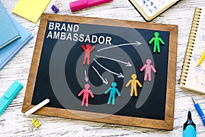 Brand ambassador concept. Board with figures and arrows.