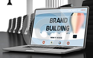 Brand Building on Laptop in Conference Room. 3D.