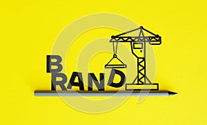Brand Building is shown using the text and picture of construction crane