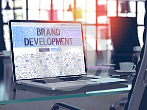 Brand Development Concept on Laptop Screen.