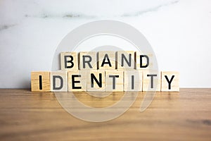 Brand Identity text from wooden blocks, branding, business management concept