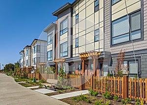 Brand new apartment building on sunny day in BC, Canada. Architectural details of modern apartment building