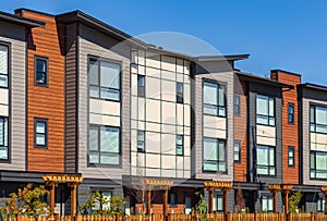 Brand new apartment building on sunny day in BC, Canada. Architectural details of modern apartment building