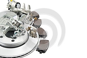 Brand new brake discs, brake caliper and brake pad set for car. isolated on white with copy space.