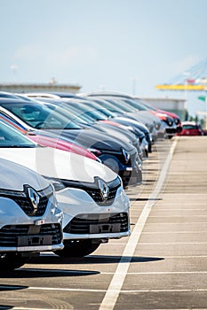 Brand new Renault cars lined up in a parking lot