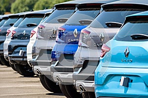 Brand new Renault cars lined up in a parking lot