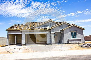 Brand New Stucco Home Under Construction With Three Car Garage