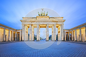 The Brandenburg Gate monument at night in Berlin city, Germany