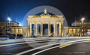 Brandenburger Tor in Berlin by night with blurred traffic lights