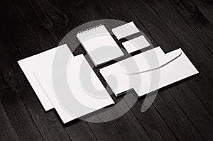 Branding stationery, mockup scene on black wooden plank, blank objects for placing your design.