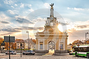 Branicki Palace in Bialystok in Poland at sunlight in autumn scenery. The entrance gate to the palace.