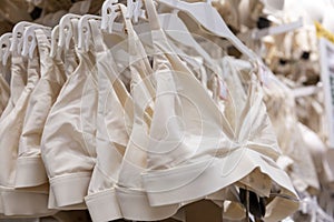 Bras on hangers in a lingerie store. Comfortable underwear without wires. Fashion and health. Close-up